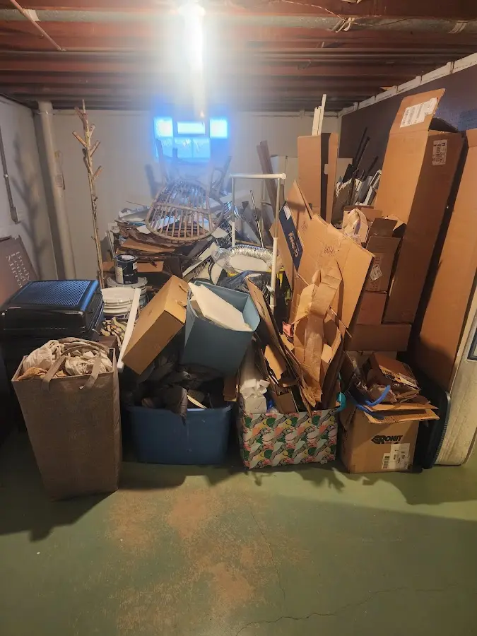 Roll-off dumpster container at job site for 2 Yard Dumpster Rental in Willow Oak